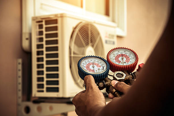 Professional Air Conditioning Service technician working in Lynn, NC